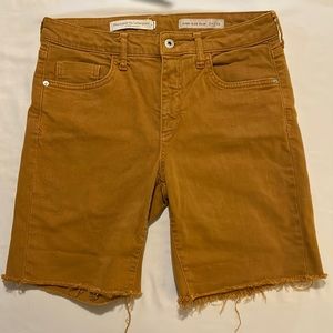 Pilcro and the letterpress mustard yellow Bermuda length shorts